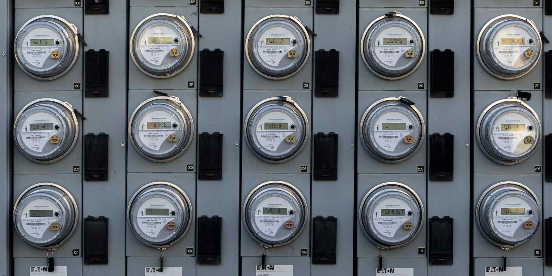 Utility meters showing kWh consumption